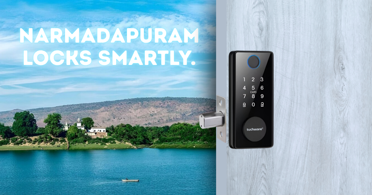 Smart Lock in Narmadapuram installed on a sleek grey door, overlooking the scenic Narmada riverfront – where smart safety flows with tradition.