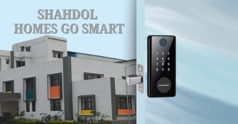 Smart Lock in Shahdol mounted on a wooden door inside a stylish apartment with modern lighting